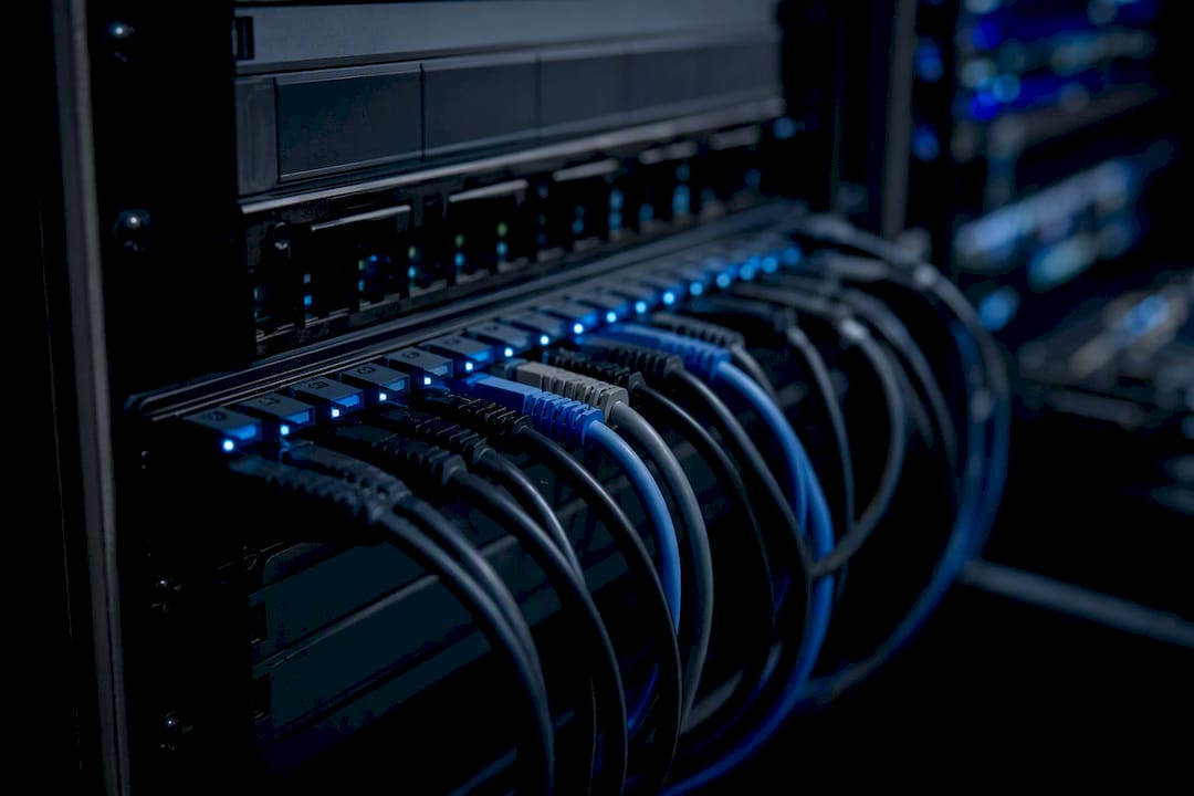 Close-up of modular patch cables on dark workspace